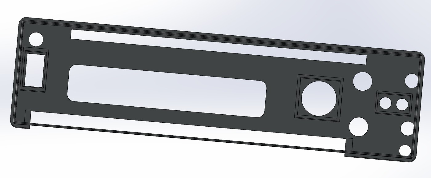 SolidWorks render of a dash or instrument faceplate with cutouts for gauges and switches