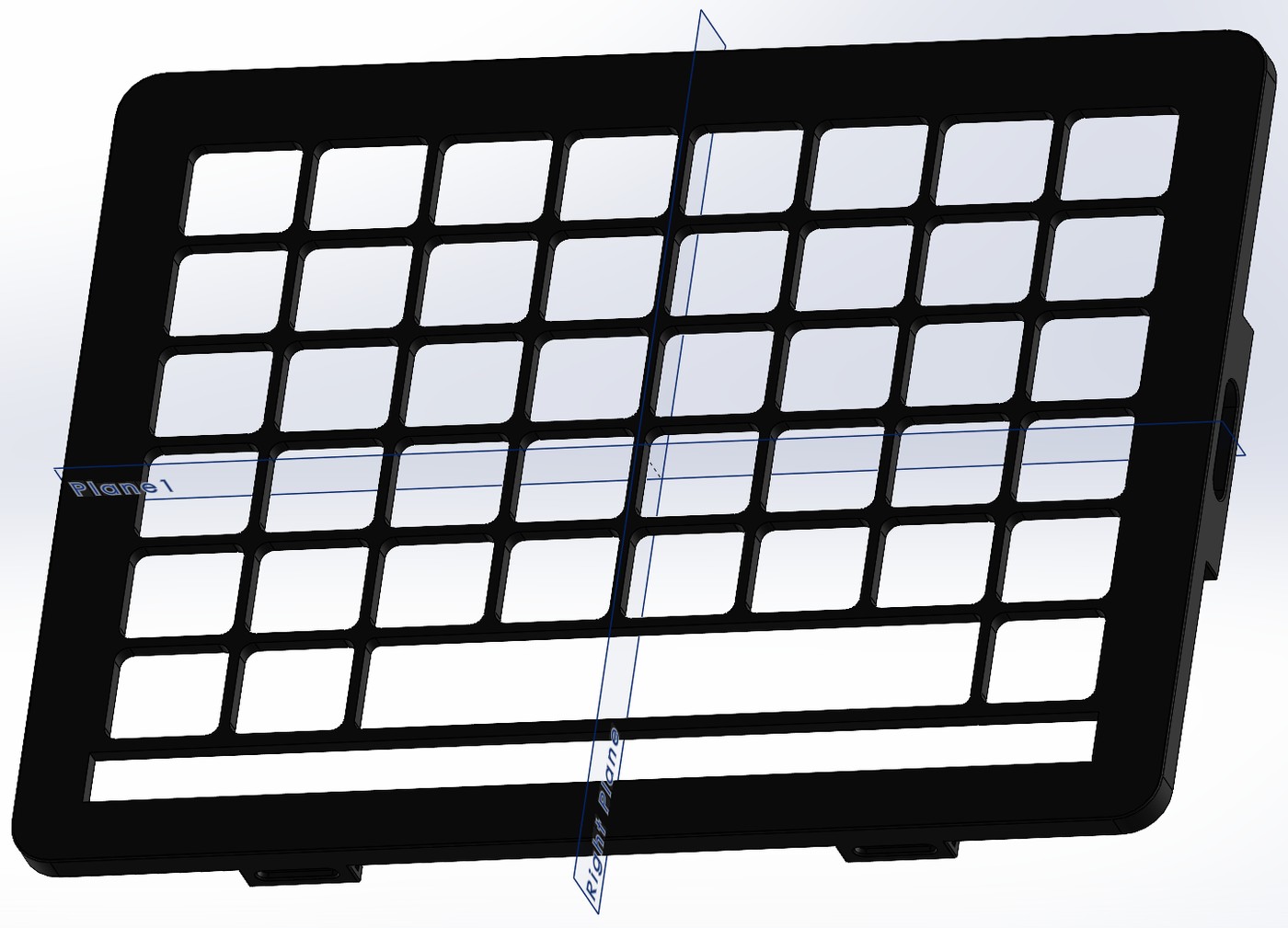 SolidWorks render of a macro keypad enclosure with a grid of button openings